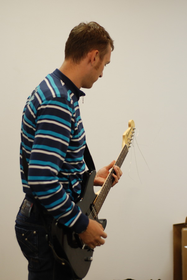 denis with a guitar